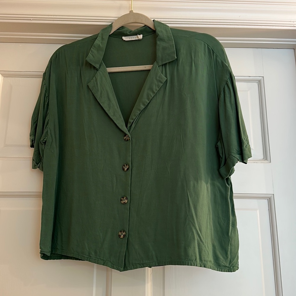 Lush brand, green button up top